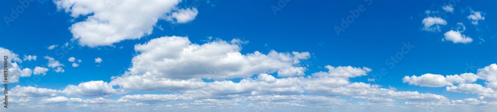 Blue Sky background with tiny Clouds. Panorama background Blue Sky background with tiny Clouds. Panorama background