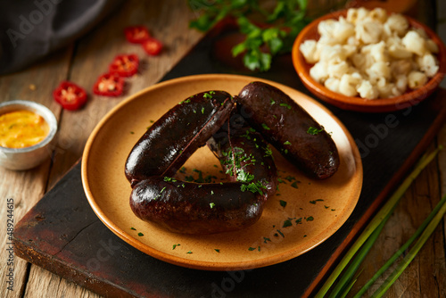 Billede på lærred Morcilla, a traditional Ecuadorian sausage. On a white background