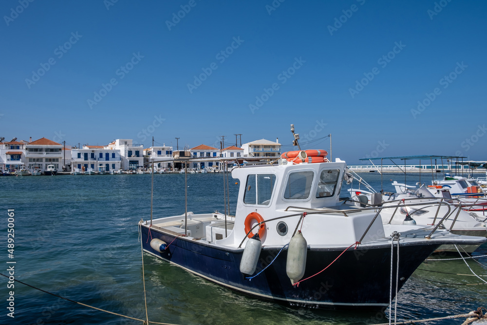 Traditional Fishing boat anchored at Elafonisos island port Greece. Sunny summer day