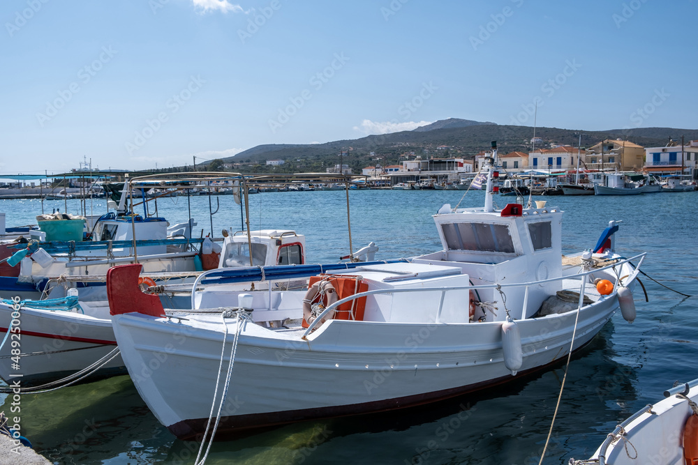 Traditional Fishing boat anchored at Elafonisos island port Greece. Sunny summer day