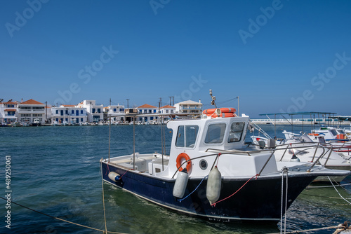 Traditional Fishing boat anchored at Elafonisos island port Greece. Sunny summer day