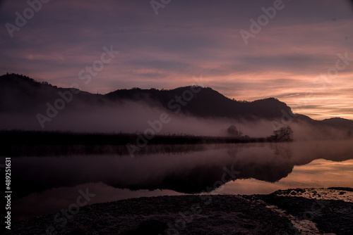 foggy winter morning on the Adda river in Brivio Lombardy