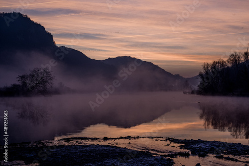 foggy winter morning on the Adda river in Brivio Lombardy