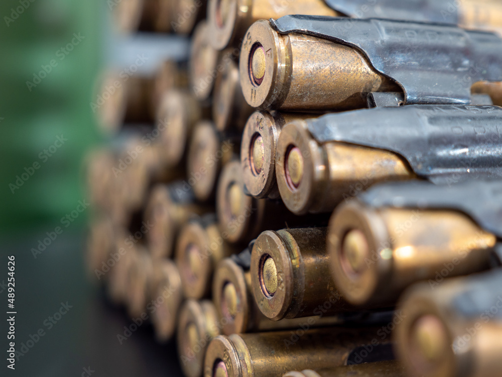 Cartridges from a machine gun on a black background Cartridges from a machine gun on a black background
