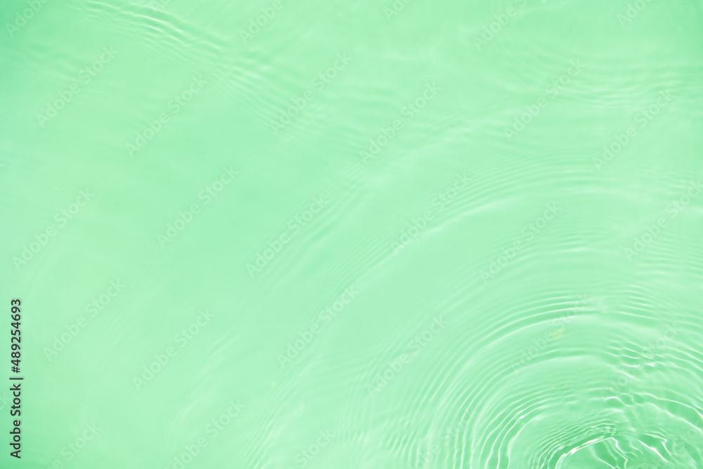 Transparent green clear water surface texture with ripples, splashes and bubbles. Abstract nature background Water waves in sunlight with copy space Cosmetic moisturizer micellar toner emulsion Transparent green clear water surface texture with ripples, splashes and bubbles. Abstract nature background Water waves in sunlight with copy space Cosmetic moisturizer micellar toner emulsion