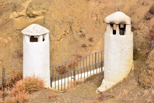 Chimeneas rústicas de casas cueva en la comarca de Guadix  photo