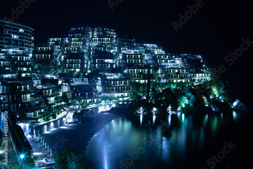 Night view to the Dukley of the Budva for publication, poster, calendar, post, screensaver, wallpaper, postcard, postcard, banner, cover, website. Night background of the city for design