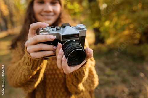 Female photographer with ph...