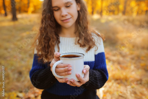 Beautiful woman with cup of...