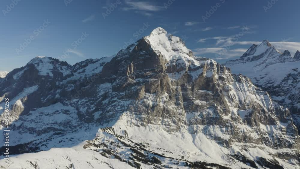 Aerial view of mountain peak covered with snow in wintertime, Lucerne, Switzerland. Aerial view of mountain peak covered with snow in wintertime, Lucerne, Switzerland.