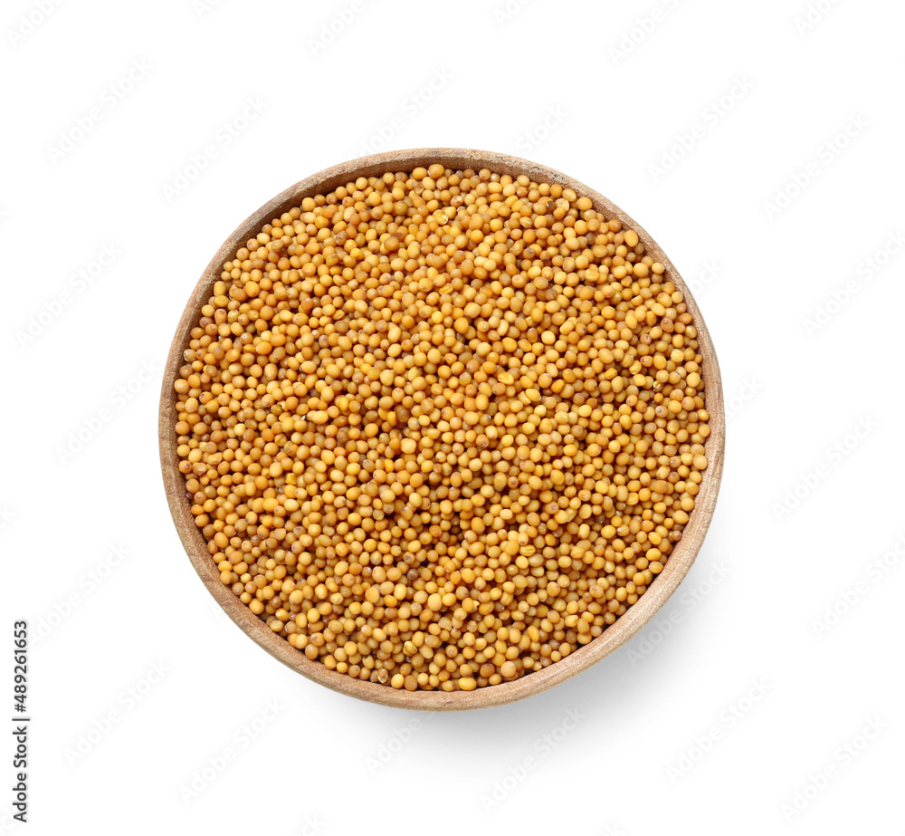 Bowl of mustard seeds isolated on white background Bowl of mustard seeds isolated on white background