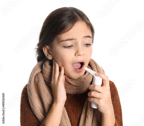 Little girl with sore throa...
