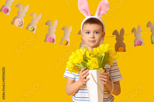 Cute little boy with bunny ...