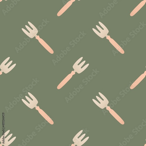 cute spring gardening pattern for kids - little pink rake on green background