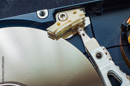 Wallpaper Mural Macro view of an HDD head resting on a disk platter and its reflection Torontodigital.ca