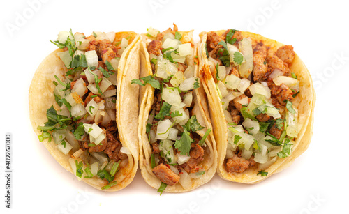 Three Spicy Chicken Street Tacos on a White Background