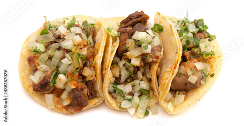 Three Delicious Buche Street Tacos Isolated on a White Background photo