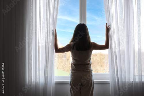 Silhouette of pretty young ...