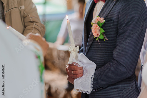 Boutonniere on the groom's jacket