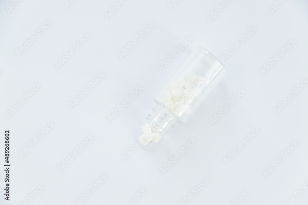Pills and capsules isolate on white background. Selective focus. Pills and capsules isolate on white background. Selective focus.