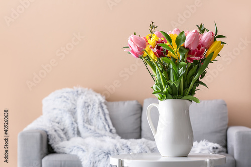 Vase with spring flowers on...