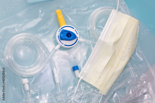 Фотография Daily self-care CAPD (continuous ambulatory peritoneal analysis) and disposable face mask