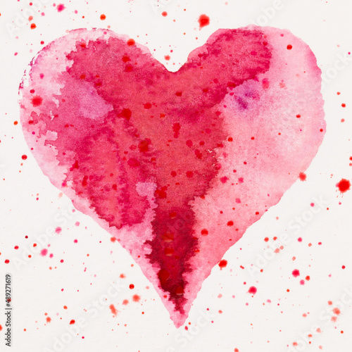Watercolor painted pink heart, on the white watercolor paper.