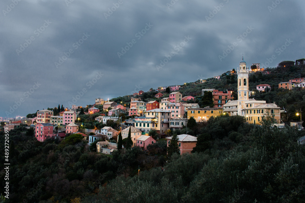 view of an italian town at the dusk with cloudy sky.