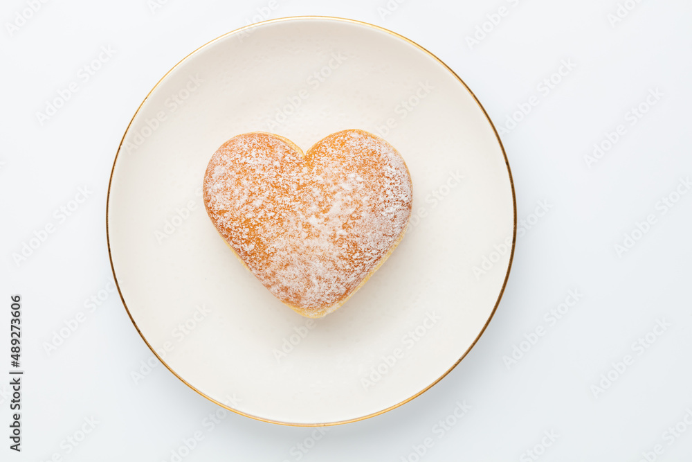 Doughnuts in the shape of a heart, heart-shaped cruller. Doughnuts in the shape of a heart, heart-shaped cruller.