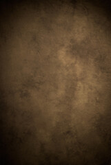 Painted canvas or muslin fabric cloth studio backdrop or background, suitable for use with portraits, products and concepts. Distinguished brown with center spot.
