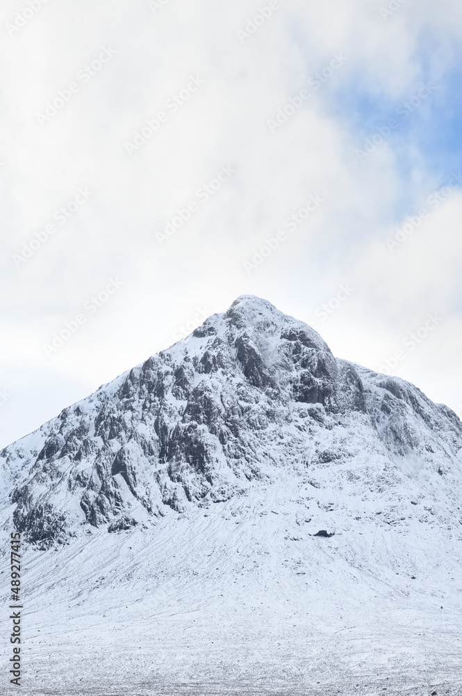 Buachaille Etive Mor covered in snow during winter aerial view