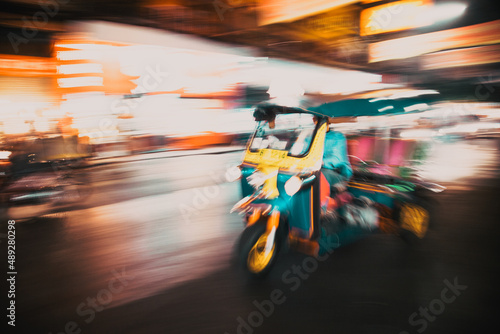 blurred tuk tuk in traffic in Bangkok © Melinda Nagy