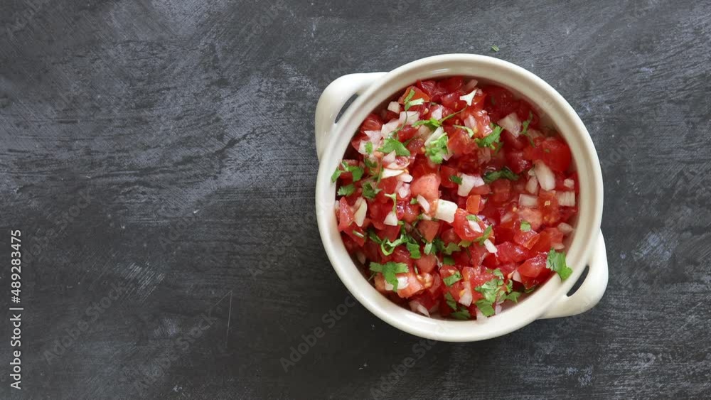Eating Salsa with a Tortilla Chip Eating Salsa with a Tortilla Chip