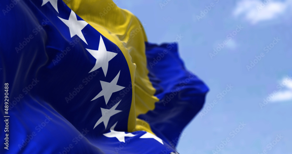 Ταπετσαρία Detail of the national flag of Bosnia and Herzegovina waving in the wind on a clear day