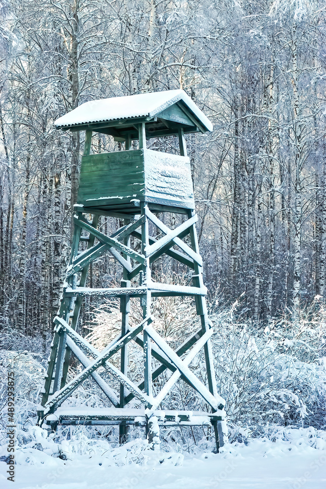 Hunting wooden observation tower in winter weather Hunting wooden observation tower in winter weather
