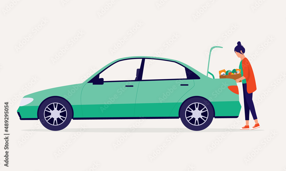 Young Woman Putting Groceries Inside Her Car Trunk. Young Woman Putting Groceries Inside Her Car Trunk.