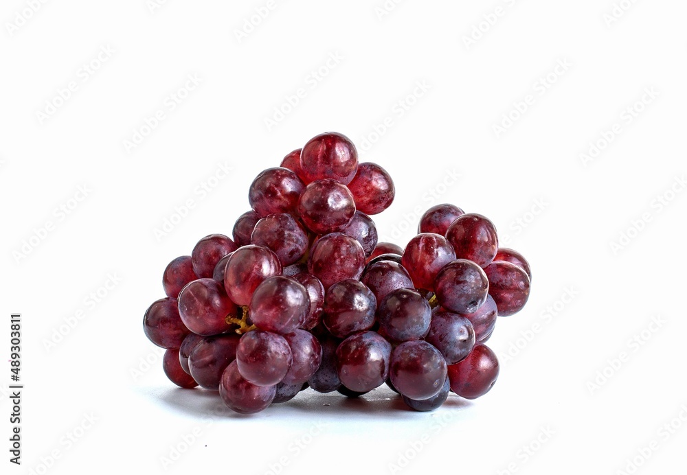 dark red grapes fruit on a white background dark red grapes fruit on a white background