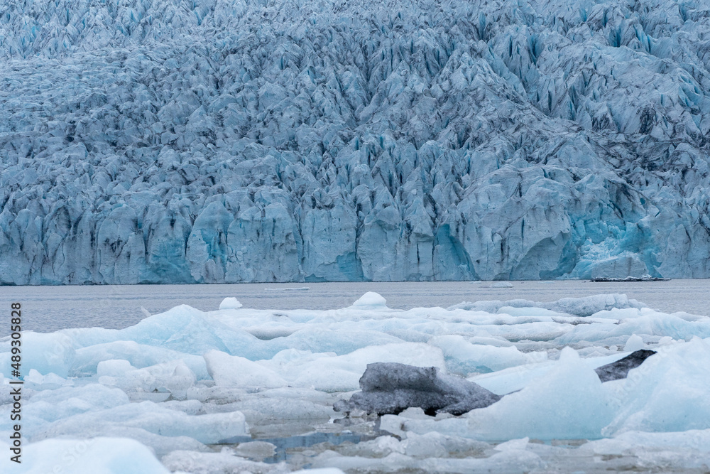 Fototapeta premium Beautiful Aerial view of the massive Glacier in Iceland and its lagoon caused by global warming -Svinafellsjokull - Jökulsárlón