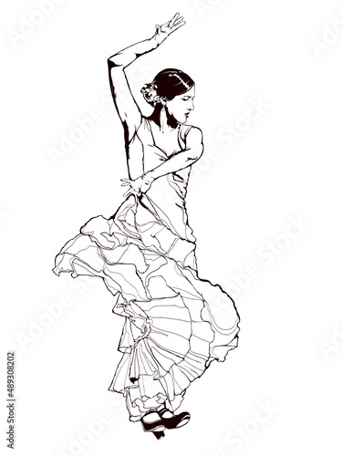 Spanish girl in red dress dances a flamenco