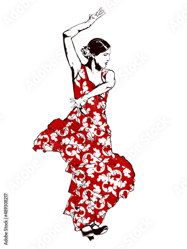Spanish girl in red dress dances a flamenco