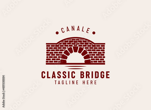 Simple Keystone Canal Waterway Brick Bridge with river wave Logo
