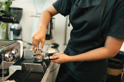 Woman barista cafe coffee uniform apron make coffee 