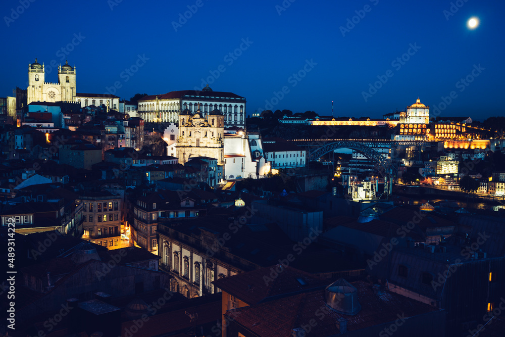 View of Porto by night with moon