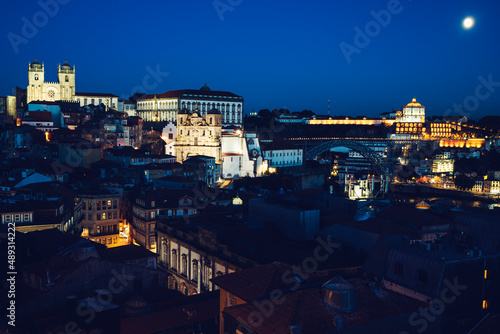 Fototapeta Naklejka Na Ścianę i Meble -  View of Porto by night with moon