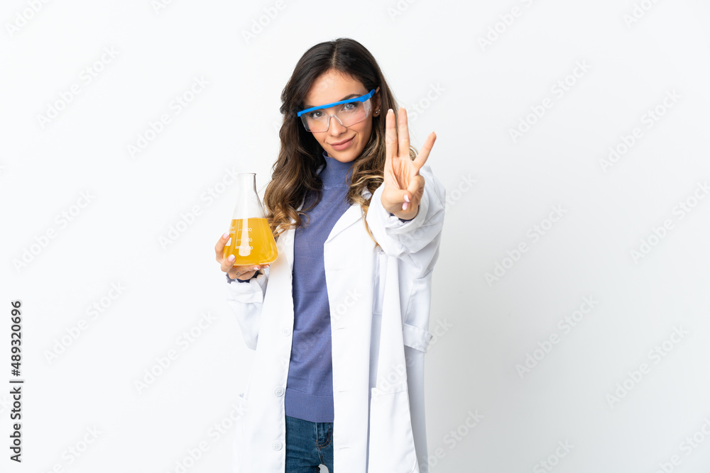 Young scientific woman isolated on white background happy and counting three with fingers Young scientific woman isolated on white background happy and counting three with fingers