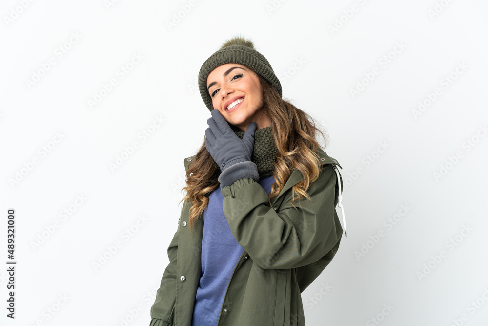 Young girl with winter hat isolated on white background happy and smiling Young girl with winter hat isolated on white background happy and smiling