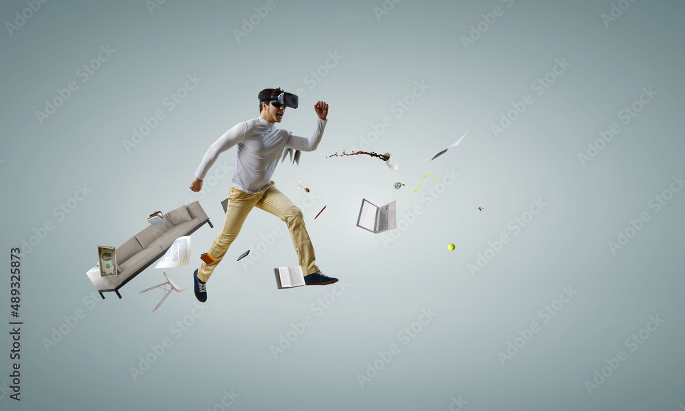 Man wearing virtual reality goggles Man wearing virtual reality goggles