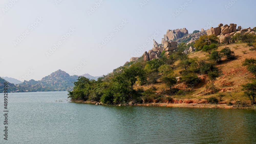 Big boulders and rocks along the Chakrairtha Lake in Hampi, Karnataka, South India