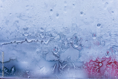 Winter natural background with frozen glass and beautiful unique texture