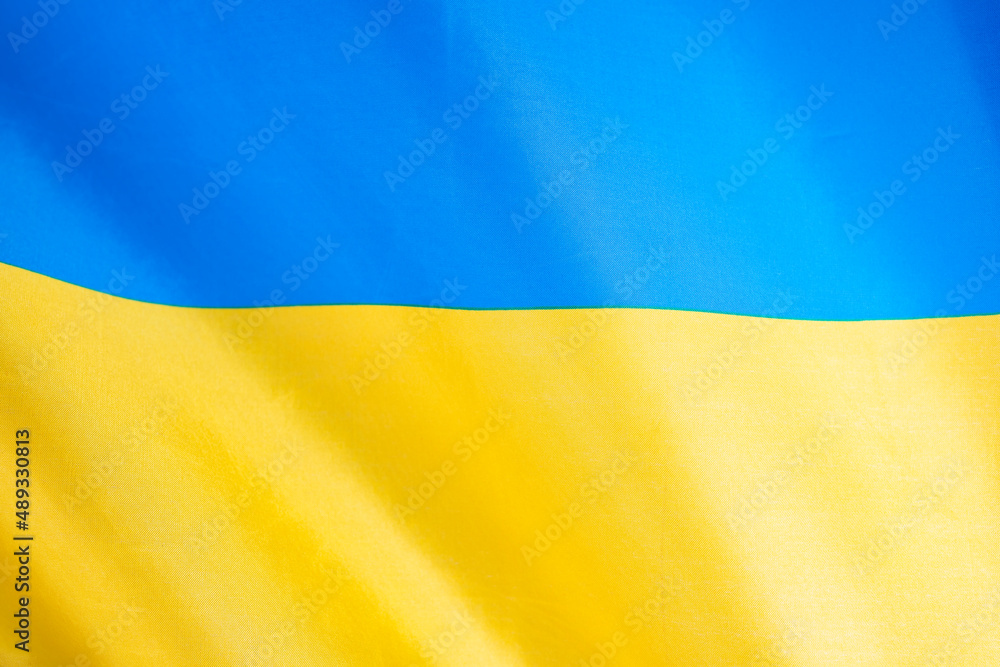 National flag of Ukraine fabric textile background National flag of Ukraine fabric textile background